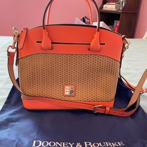 Dooney Bourke Coral and Tan hand bag.  Like new/rarely used (if ever).